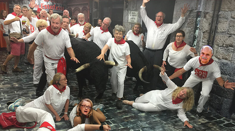 Tom runs with the bull