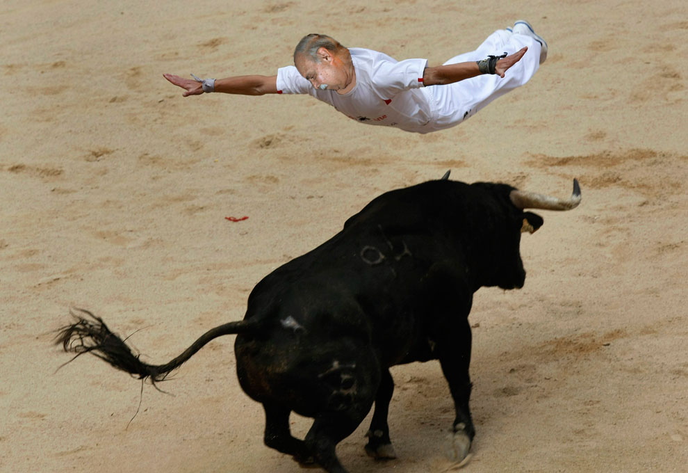 Tom runs with the bull